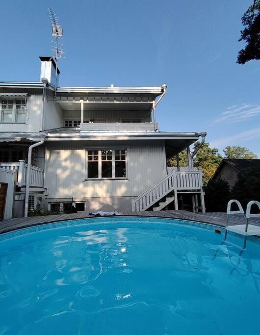 House With A Pool Near A Train Station
